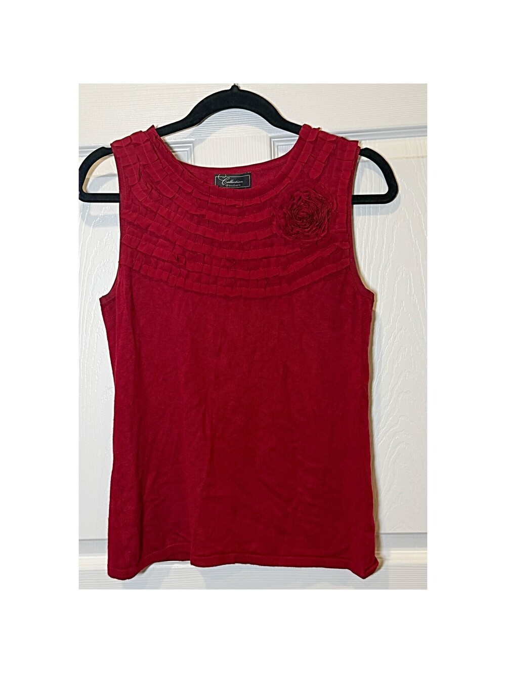 Sleeveless embellished neck top